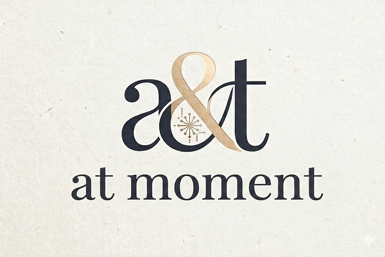 At Moment Logo